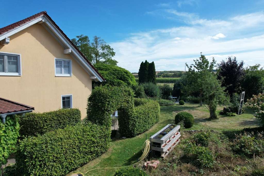 Immobilie in Borgentreich - Niedrigenergie-Holzhaus mit Weitblick, Südgarten & Garage in Borgentreich-Natzungen - Bild 3