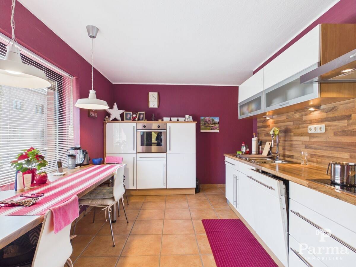 Immobilie in Niederzier - Gepflegtes Reihenmittehaus mit großem Garten in familienfreundlicher Lage von Huchem-Stammeln - Bild 2
