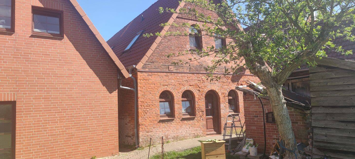 Immobilie in Bücken - Anlageobjekt mit 9 WE innerhalb eines 3-teiligen Gebäudekomplexes im Kernbereich von Bücken zu verkaufen! - Bild 3