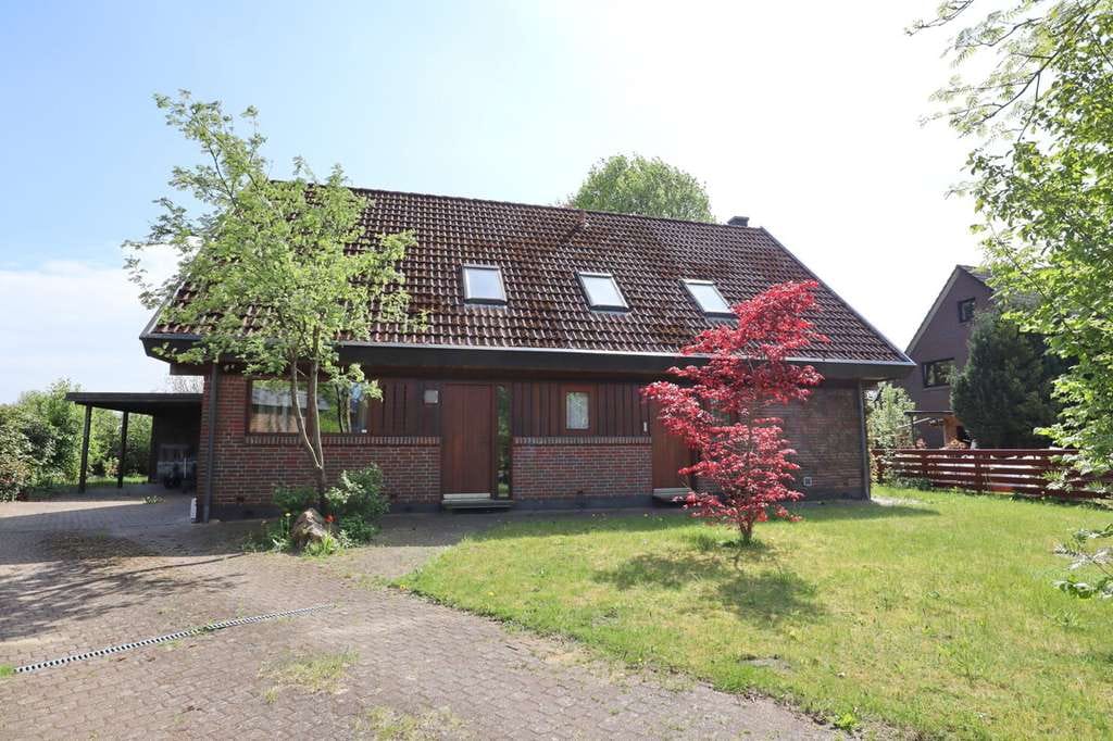 Immobilie in Alveslohe - Gut geschnittenes Einfamilienhaus auf großzügigem Grundstück in Feldrandlage in Alveslohe - Bild 1