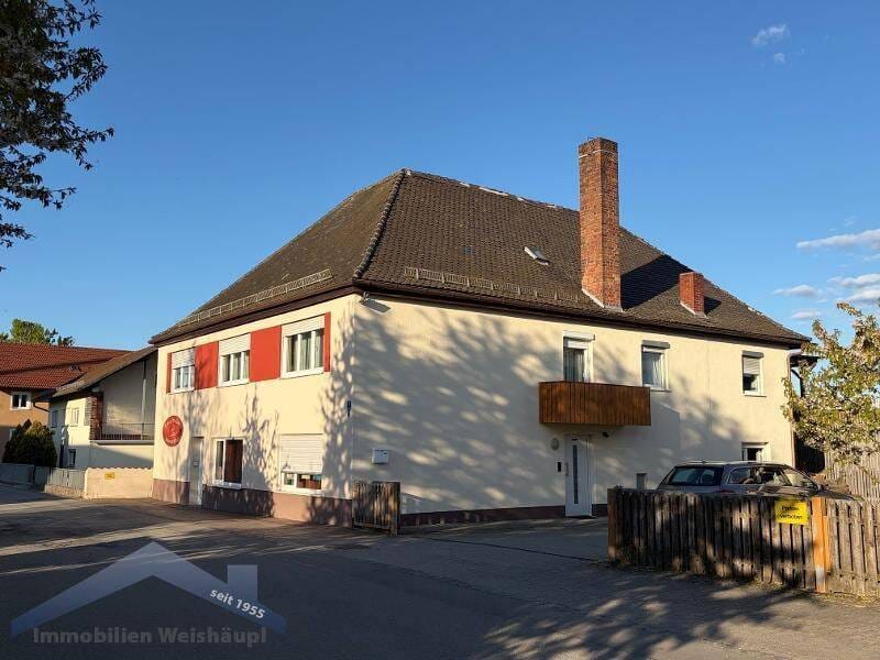 Immobilie in Künzing - Künzing gepflegtes Wohnhaus mit Büro/Praxis ,Nebengebäude und Garage - Bild 1