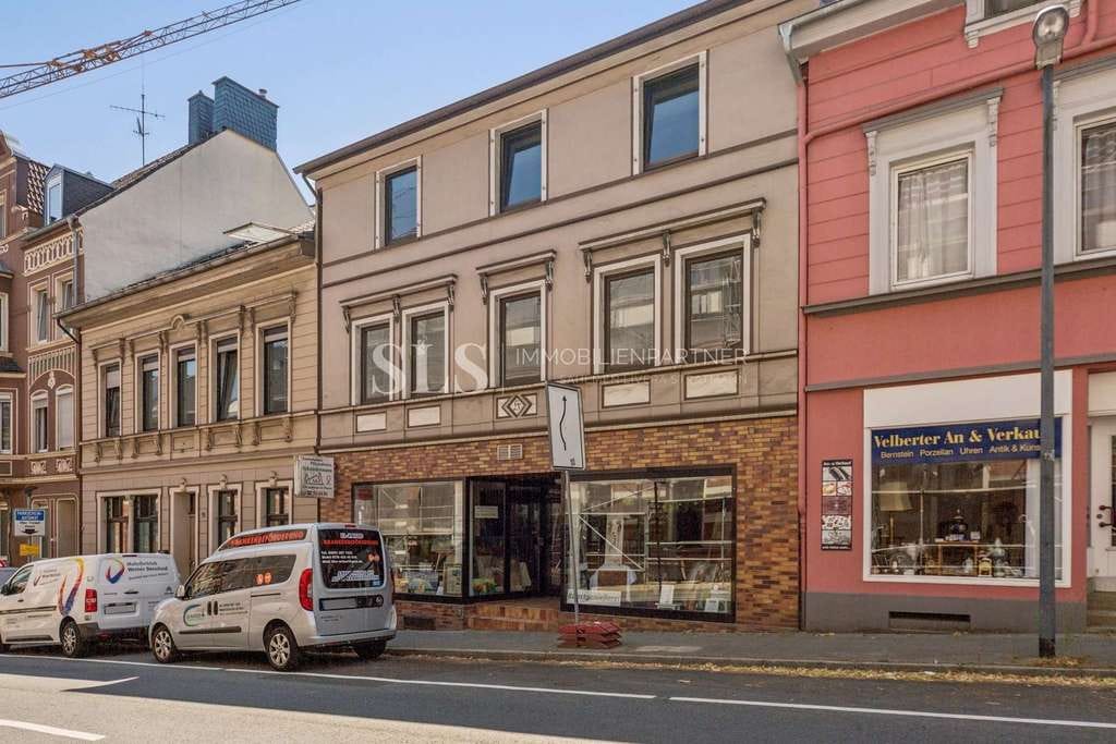 Immobilie in Velbert - Sanierungsobjekt mit Potential - komplett leerstehendes Wohn & Geschäftshaus mit Terrasse - Bild 1