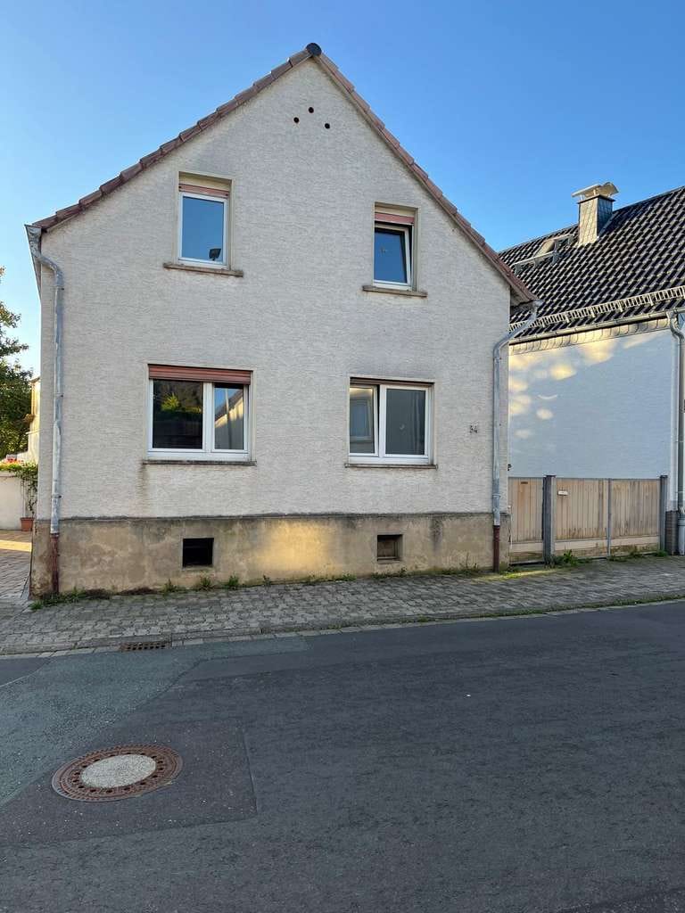 Immobilie in Nidderau - Einfamilienhaus in Nidderau - ca. 120 m² Wohnfläche, Garten, Garage, sanierungsbedürftig - Bild 1