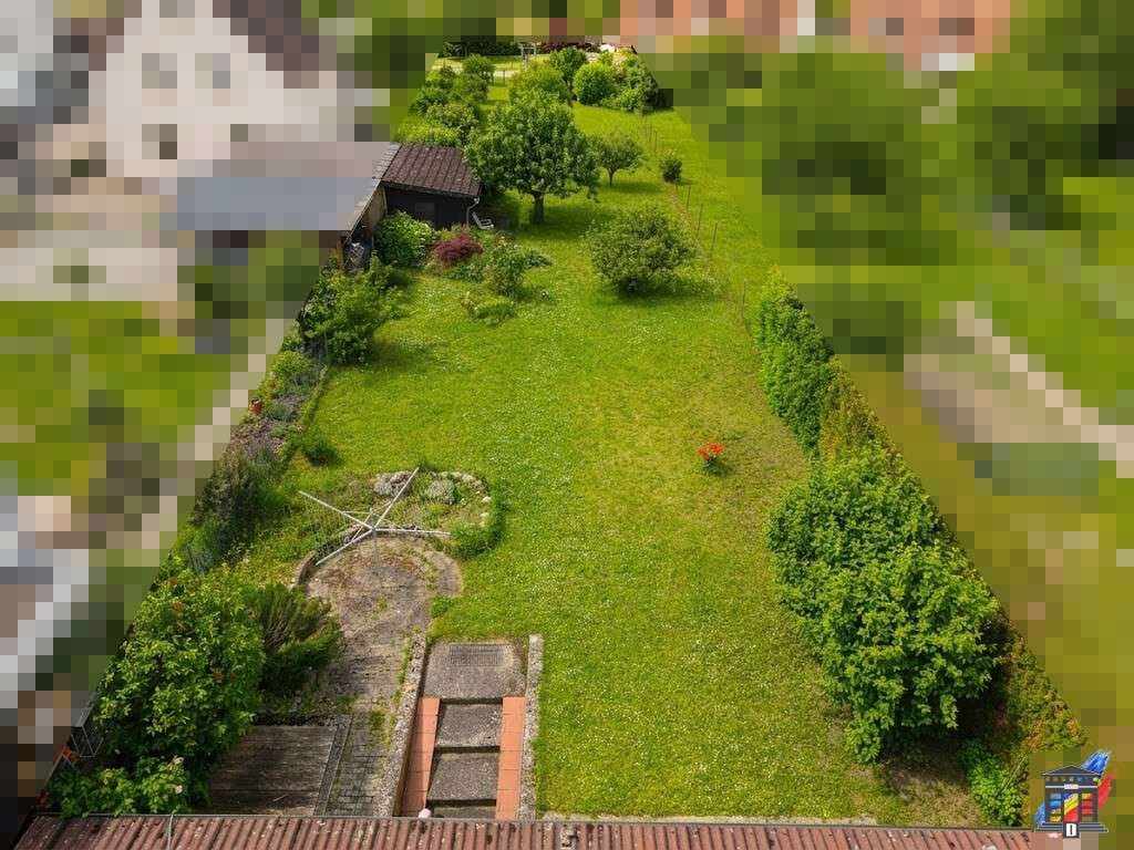Immobilie in Ubstadt-Weiher - Vielseitiges Dreifamilienhaus mit großem Garten - bezugsfrei - Bild 2