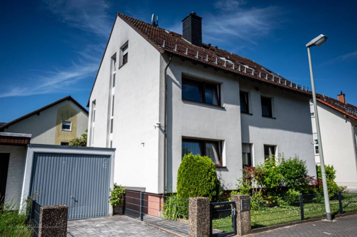 Immobilie in Flörsheim - Freistehendes Mehrfamilienhaus mit 3 Wohnungen - Bild 1