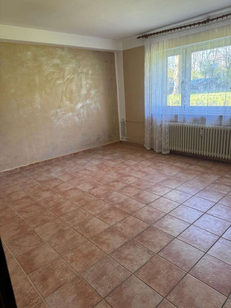 Immobilie in Maintal - Charmante 3-ZimmerSouterrainwohnung im Hochhaus mit Gartennutzung - Bild 1