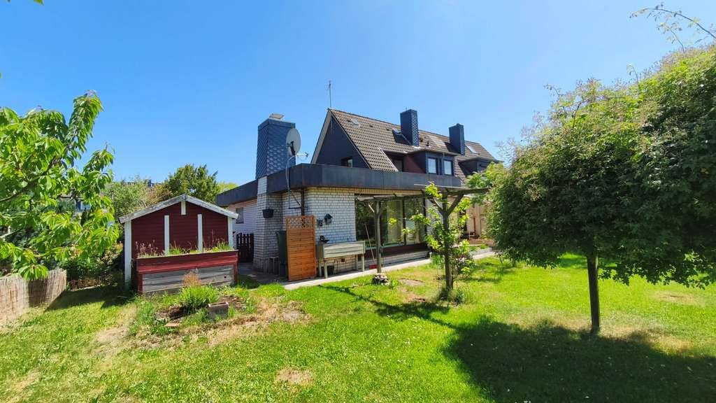 Immobilie in Uetersen - Zwei Wohneinheiten unter einem Dach – vielseitige Doppelhaushälfte mit Gartenidylle in Uetersen - Bild 3