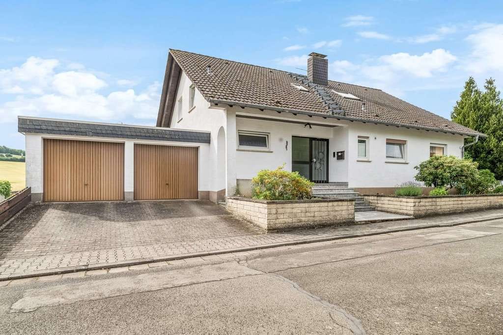 Immobilie in Neunkirchen am Potzberg - Idyllisches Einfamilienhaus mit erholsamen Fernblick - Bild 1