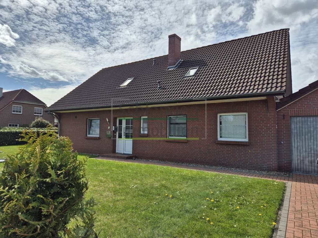 Immobilie in Saterland - ZFH mit Garage, Carport und Garten in Saterland - Strücklingen - Bild 0