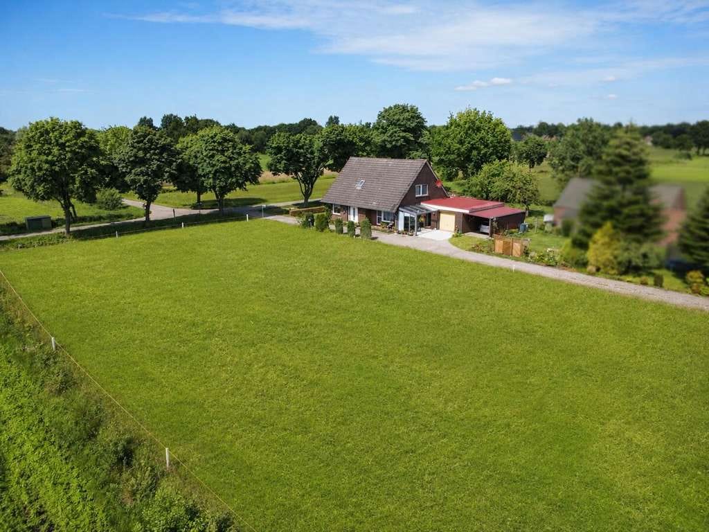 Immobilie in Ihlow - Wohnen im Grünen: Familienfreundliches Einfamilienhaus mit Garage - Bild 1