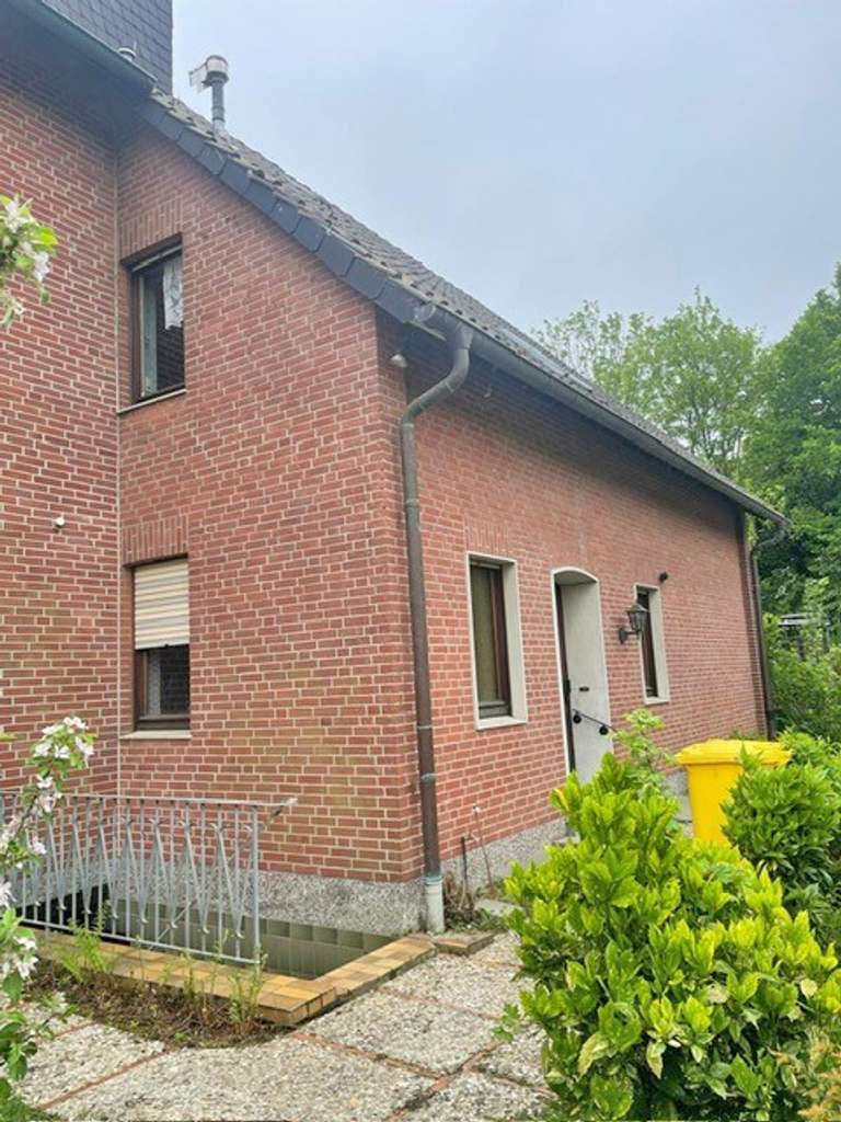 Immobilie in Titz - Gepflegtes freistehendes Einfamilienhaus mit ELW in 52445 Titz-Jackerath - Bild 1