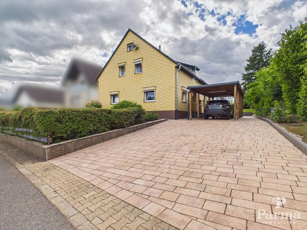 Immobilie in Hürtgenwald - Freistehendes Einfamilienhaus mit Garage, Carport und schönem Garten - Bild 0