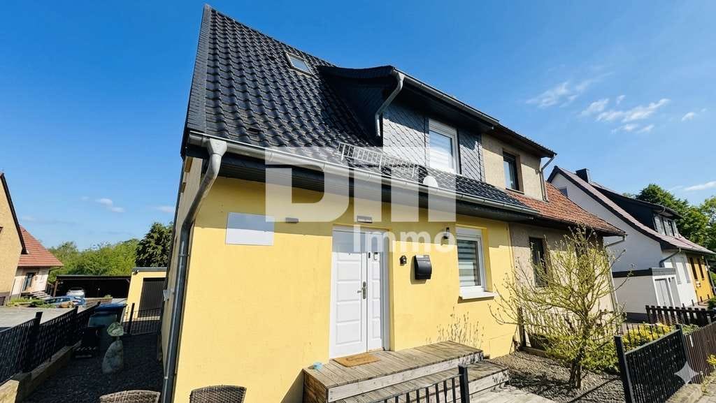 Immobilie in Northeim - Vielseitiges Immobilien-Ensemble mit 2 modernisierten Haushälften + Carport und Garten/Terrasse - Bild 1