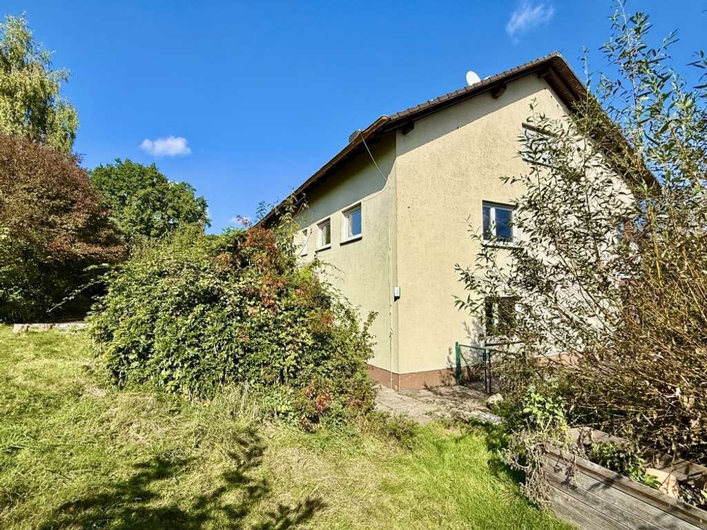 Immobilie in Mörlenbach - +++ Zweifamilienhaus mit Ausbaureserve in Feldrandlage +++ - Bild 1