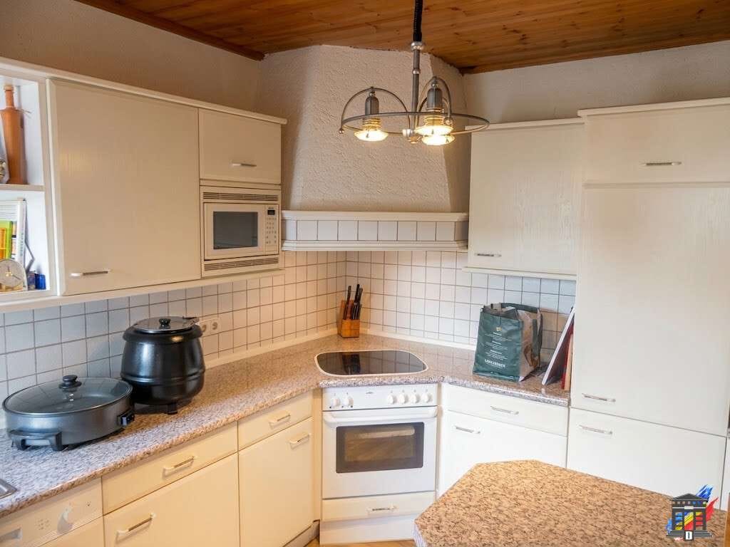 Immobilie in Ubstadt-Weiher - Vielseitiges Dreifamilienhaus mit großem Garten - bezugsfrei - Bild 4