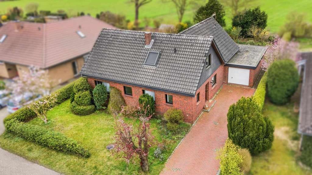 Immobilie in Wiefelstede - Naturnahes Wohnen mit Stadtanschluss!
Einfamilienhaus in ruhiger Feldrandlage - Bild 3