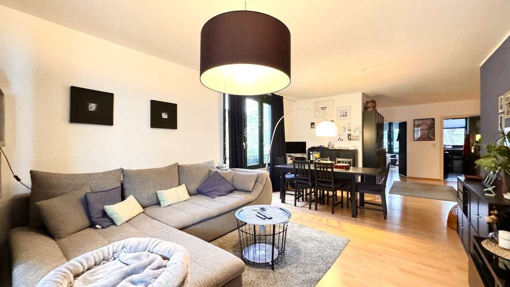 Immobilie in Monheim am Rhein - Vermietete Etagenwohnung mit Wintergarten und  PKW-Stellplatz im soliden Objekt in ruhiger Lage - Bild 1