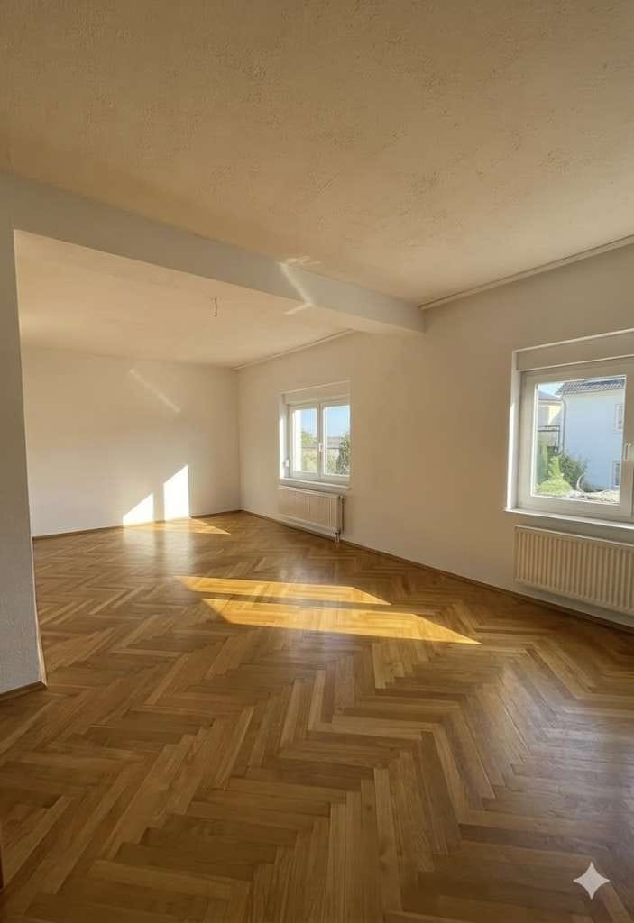 Immobilie in Kirchheim am Neckar - Super moderne und große Eigentumswohnung mit Garten und Einzegarage - Bild 2
