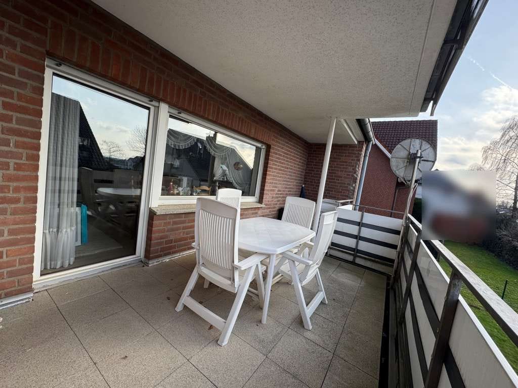 Immobilie in Bad Laer - Attraktive 2‑Zimmer‑Eigentumswohnung mit großer Loggia und Tiefgaragenstellplatz in Bad Laer - Bild 1