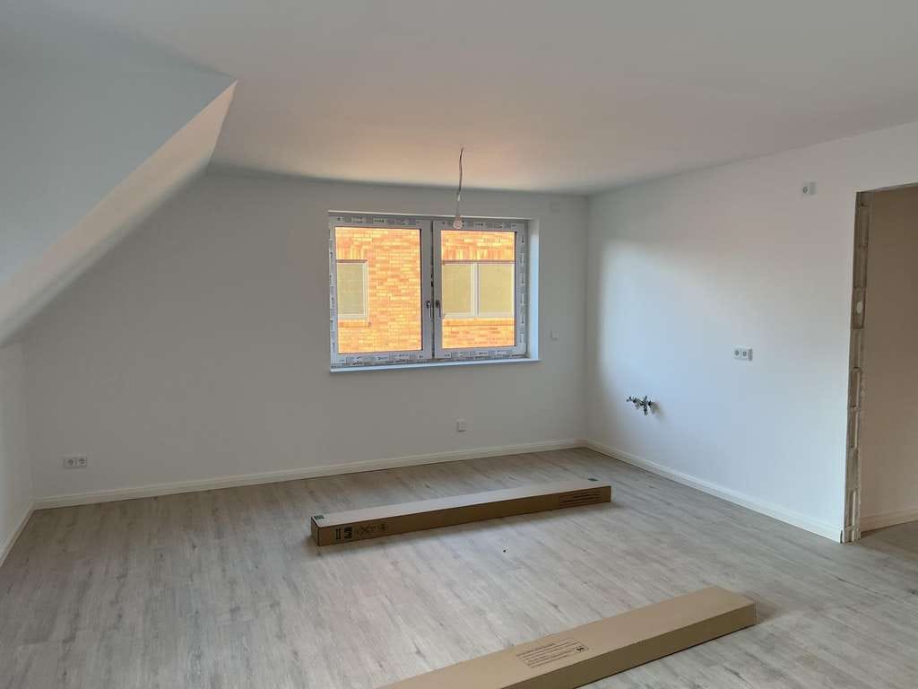 Immobilie in Bliedersdorf - Sichere 5,6 % Rendite: Vermietete A+ Maisonette (Klinker/Glas-Design) inkl. 2 Stellplätzen. - Bild 1