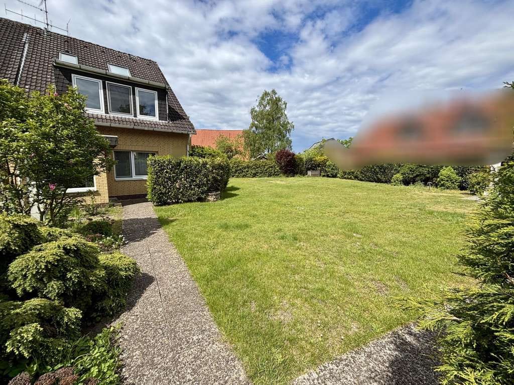 Immobilie in Wedemark - Gepflegtes Haus mit Baugrundstück - Bild 1
