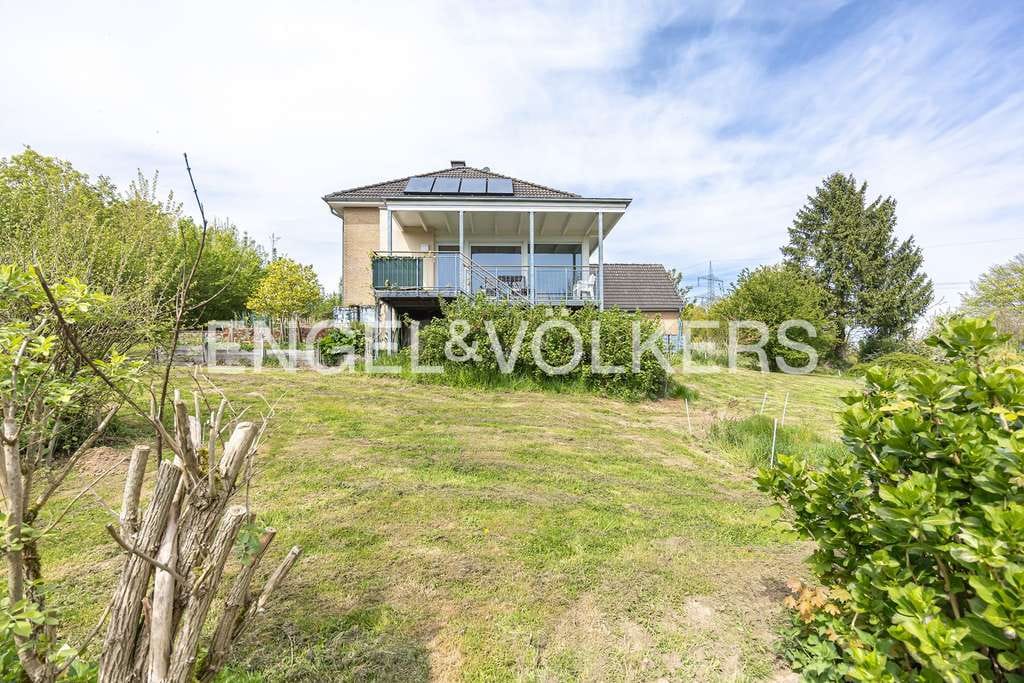 Immobilie in Westerkappeln - Großzügiges Einfamilienhaus mit weitläufigem Grundstück und Blick auf den Teutoburger Wald - Bild 3