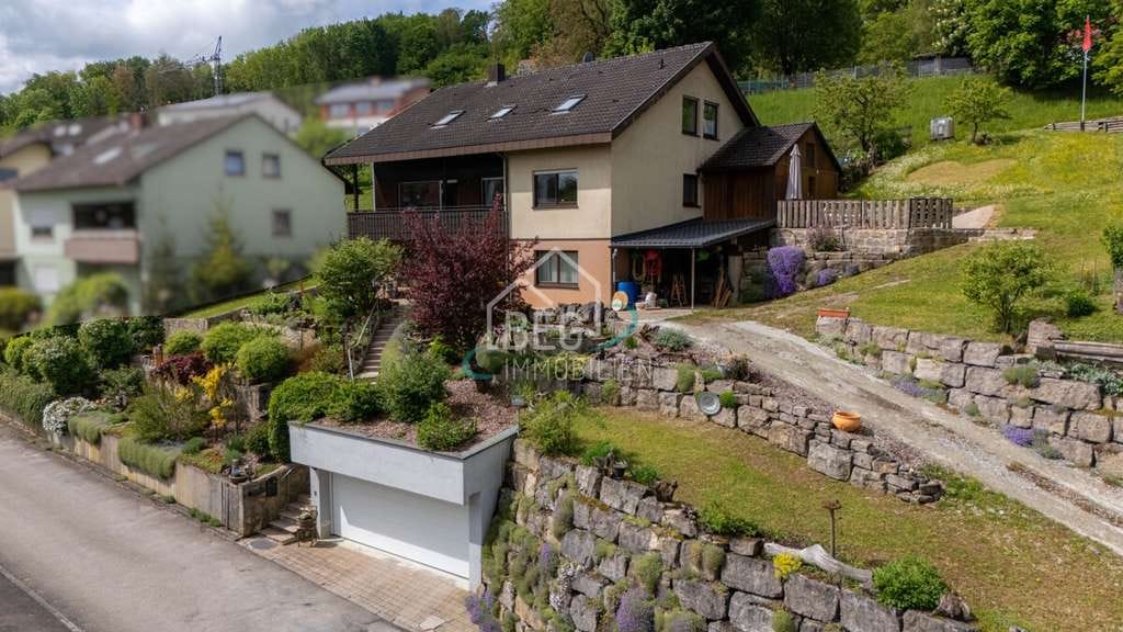 Immobilie in Mulfingen - Einfamilienhaus mit Einliegerwohnung und 
zusätzlichem Bauplatz in ruhiger Waldrandlage - Bild 4