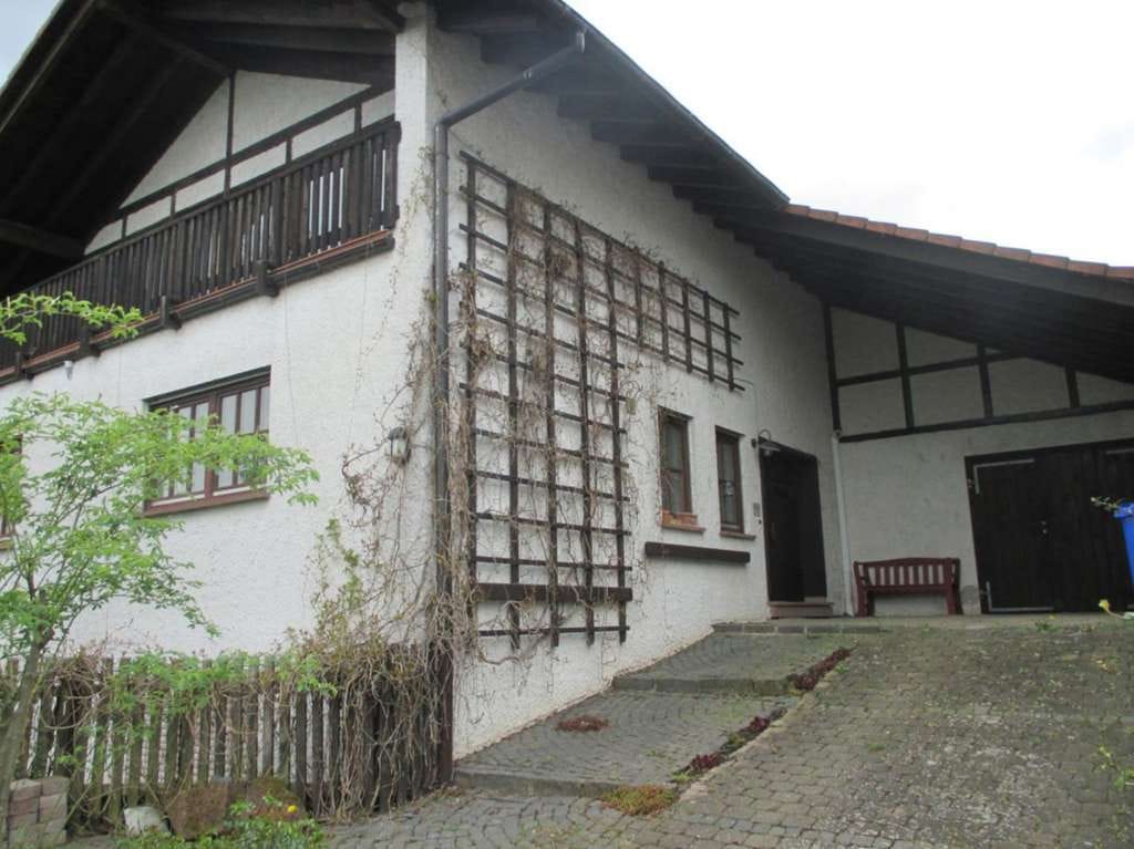 Immobilie in Wölfersheim - Einfamilienhaus direkt an Feld und Streuobstwiesen - Bild 0