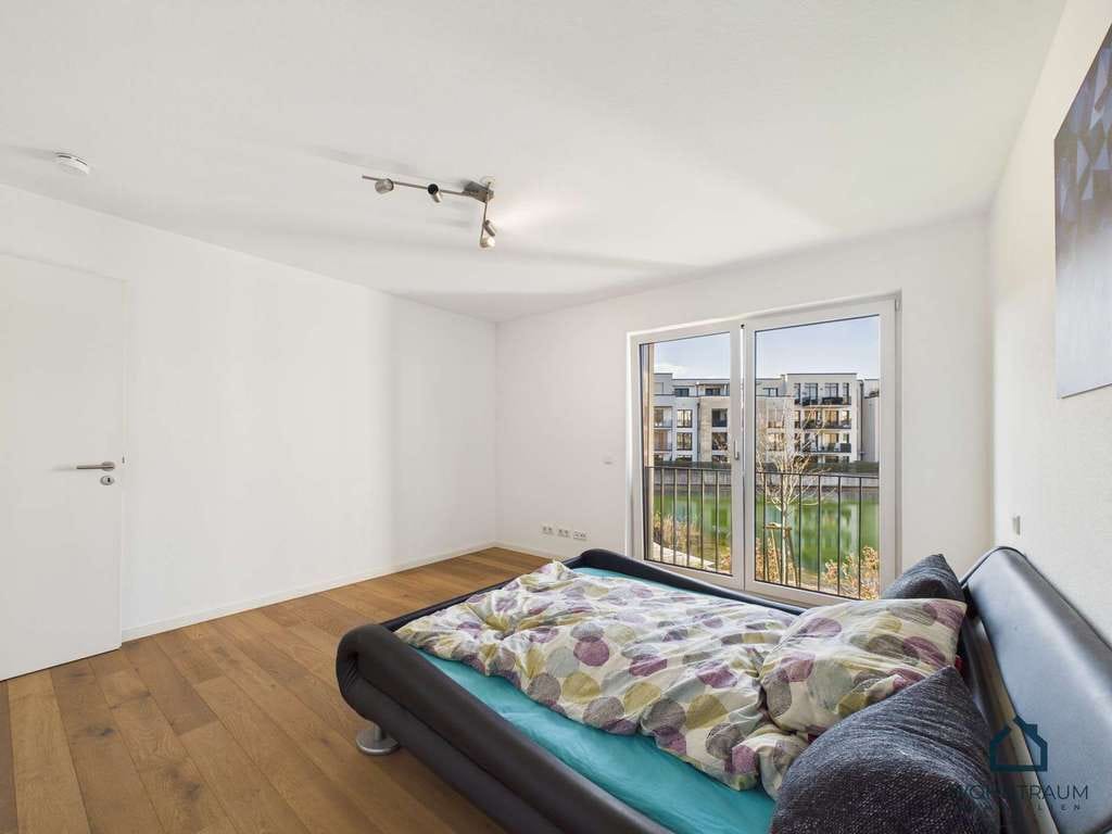 Immobilie in Kenzingen - Traumhafte 3-Zimmer Wohnung mit Teichblick - Balkon & Tiefgarage - Bild 4