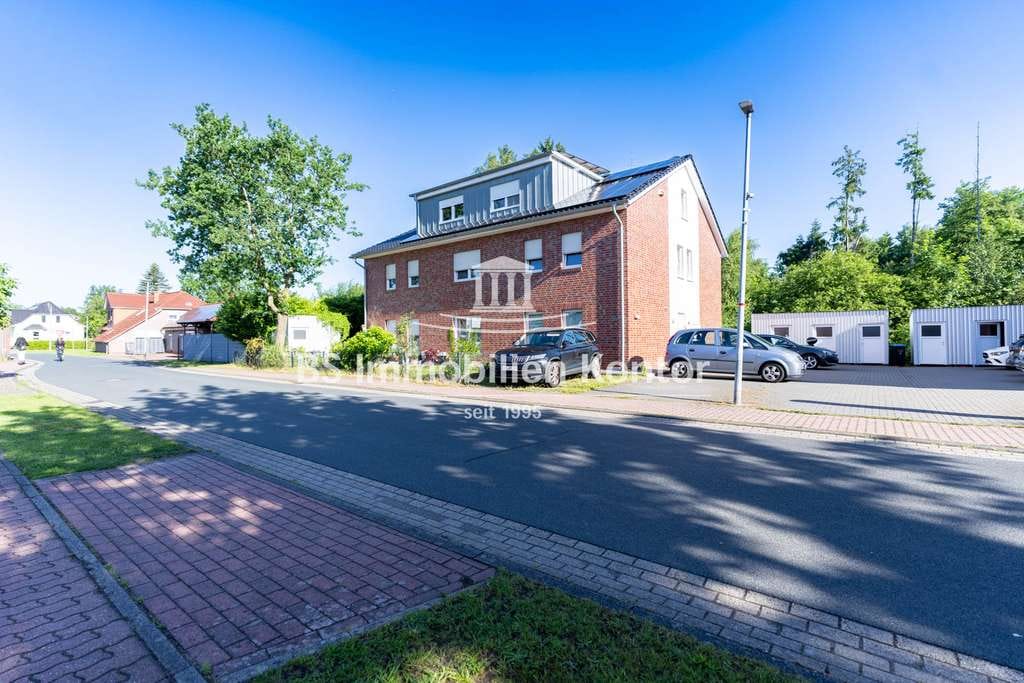 Immobilie in Ostrhauderfehn - OG-Wohnung Nr. 03 mit Stellplatz und Balkon in zentraler Lage! - Bild 4