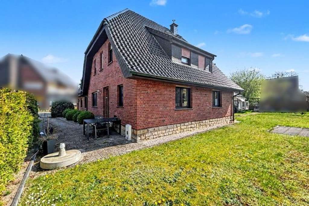 Immobilie in Ibbenbüren - Charmantes Zweifamilienhaus mit großem Grundstück in ruhiger Lage von Ibbenbüren-Dörenthe - Bild 0