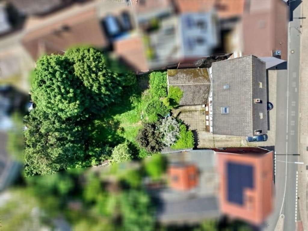 Immobilie in Oelde - Mehrfamilienhaus mit Potenzial in zentrumsnaher Lage von Oelde – vielseitige Nutzungsmöglichkeiten - Bild 3