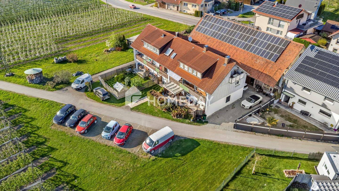 Immobilie in Kressbronn am Bodensee - Attraktives MFH mit 6 Wohneinheiten, Stellplätzen, Loggien und solider Mieteinnahme - Bild 2