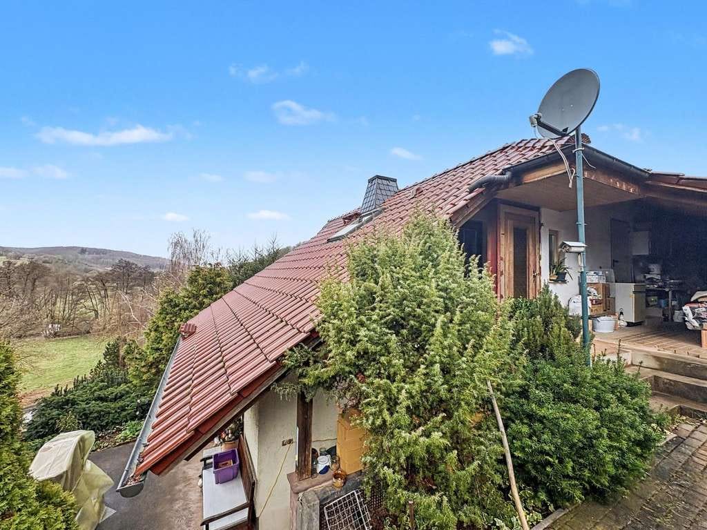 Immobilie in Mansfeld - Charmantes Einfamilienhaus in idyllischer Hanglage in Biesenrode - Bild 1