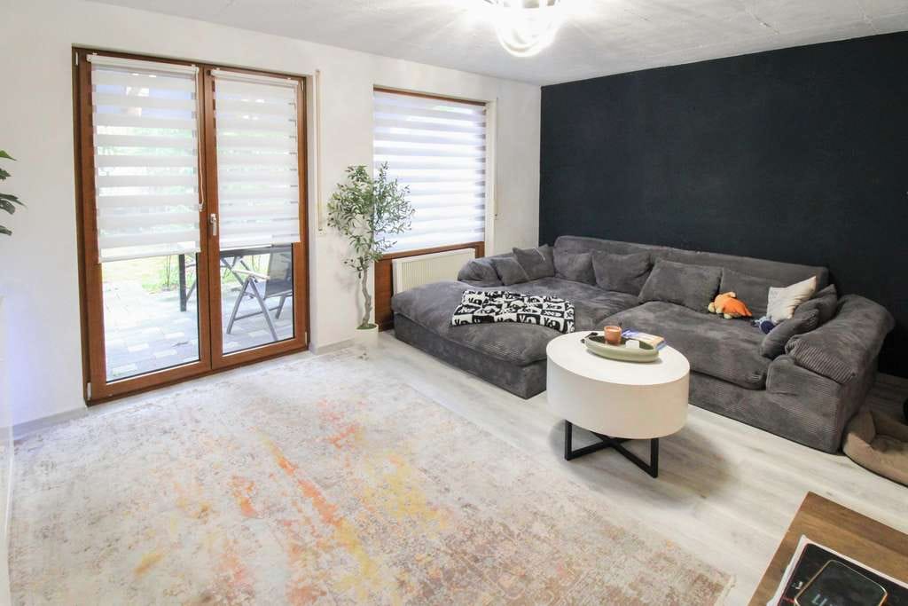 Immobilie in Renningen - Ihr neues Familienglück: Gepflegtes Reihenmittelhaus mit Garten & Garage in Renningen - Bild 1