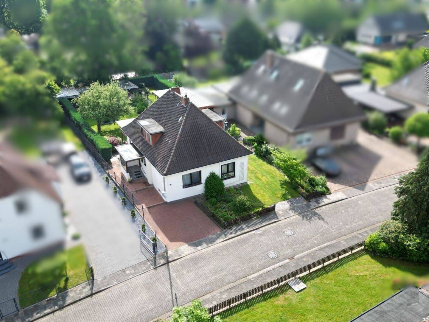 Immobilie in Hilgermissen - Bungalow mit besonderem Charme und idyllischem Garten in zentrumsnaher Lage - Bild 4