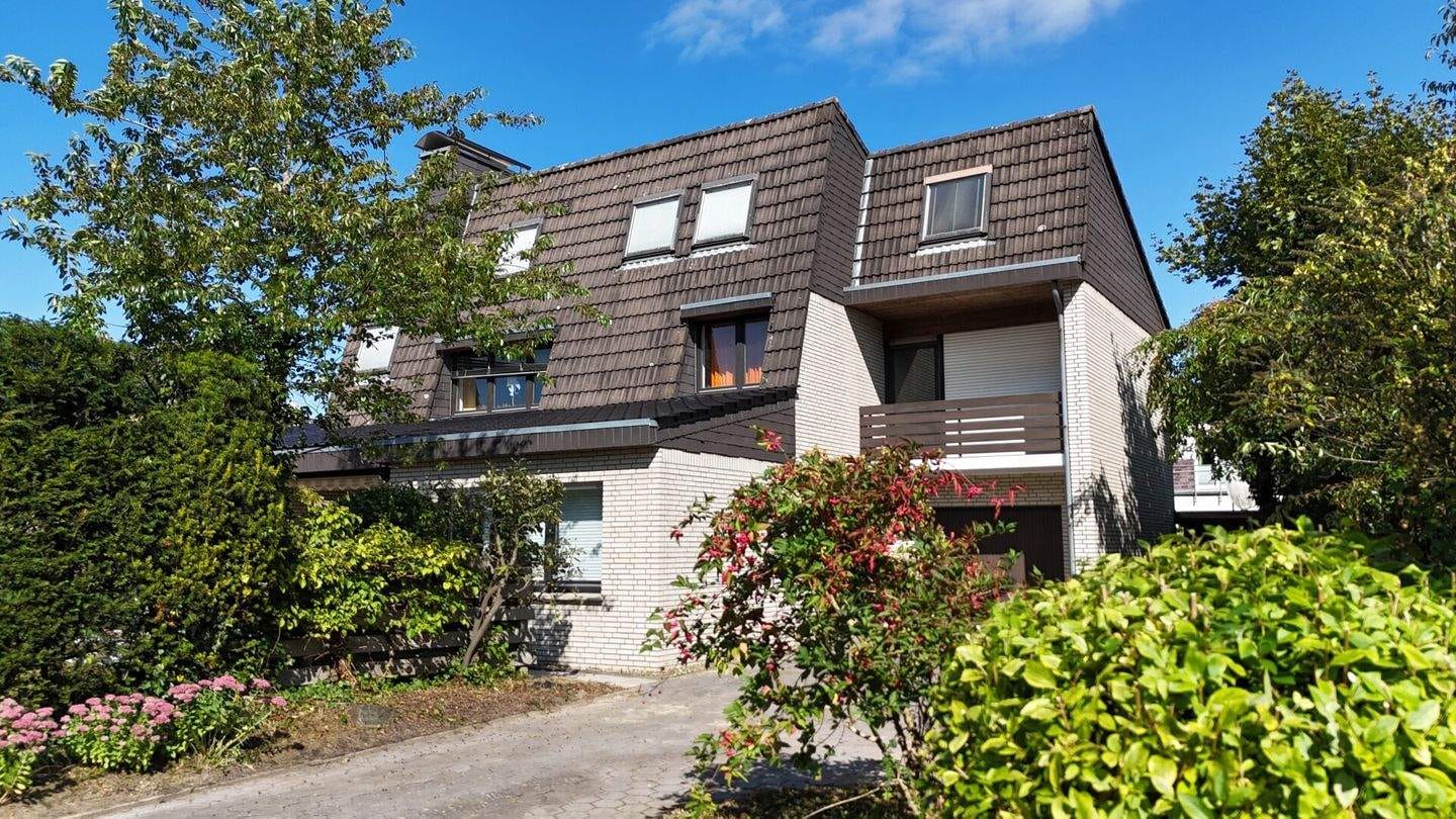 Immobilie in Wildeshausen - Schulviertel: EFH über 4 Ebenen auf knapp 206 m² Wohnfläche, ausgeb. DB mit Garage - Bild 0