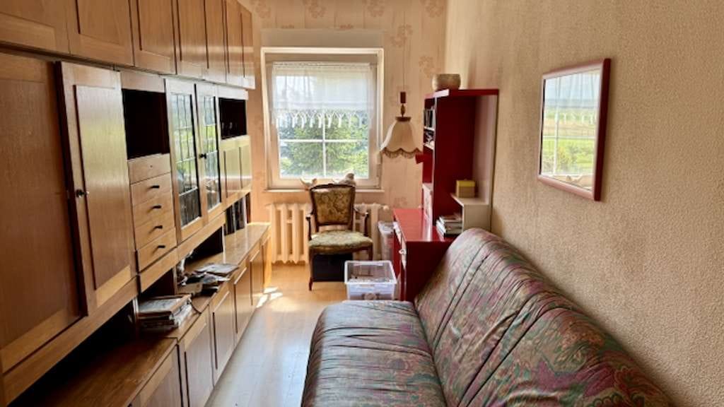 Immobilie in Aken (Elbe) - Charmantes Reihenmittelhaus mit 4 Zimmern und Garage in Aken (Elbe) mit Blick ins Grüne - Bild 4