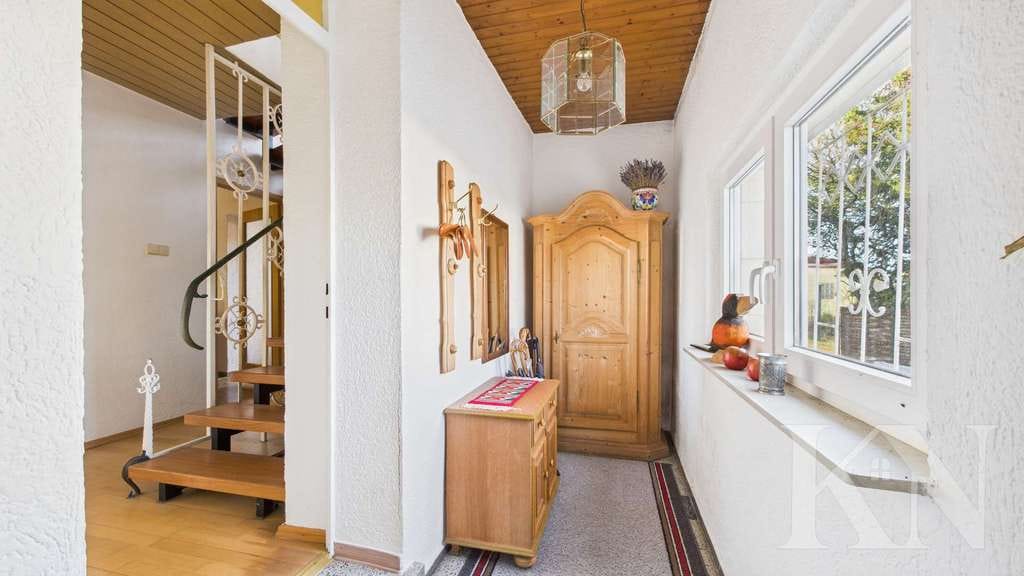 Immobilie in Heusweiler - Geräumiges Einfamilienhaus mit Garten, Garage und vielfältigen Möglichkeiten! - Bild 1