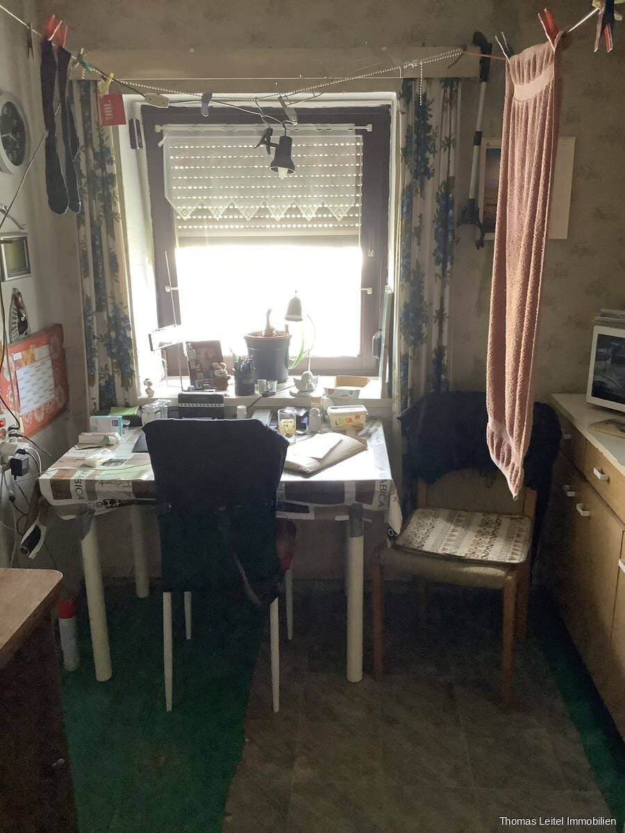 Immobilie in Gröningen - Kleine DHH, sanierungsbedürftig mit großem Grundstück - Bild 2