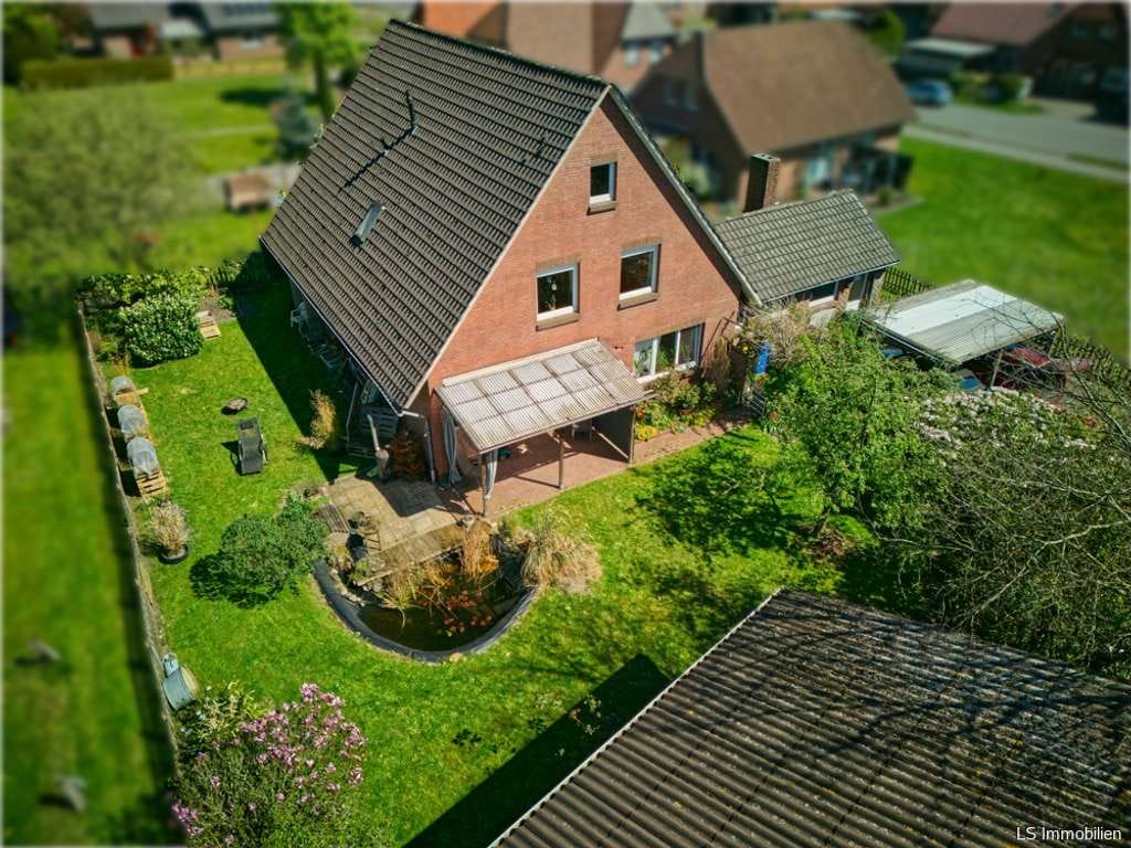 Immobilie in Westerstede - Zweifamilienhaus in ruhiger Lage von Westerstede-Linswege - Bild 0