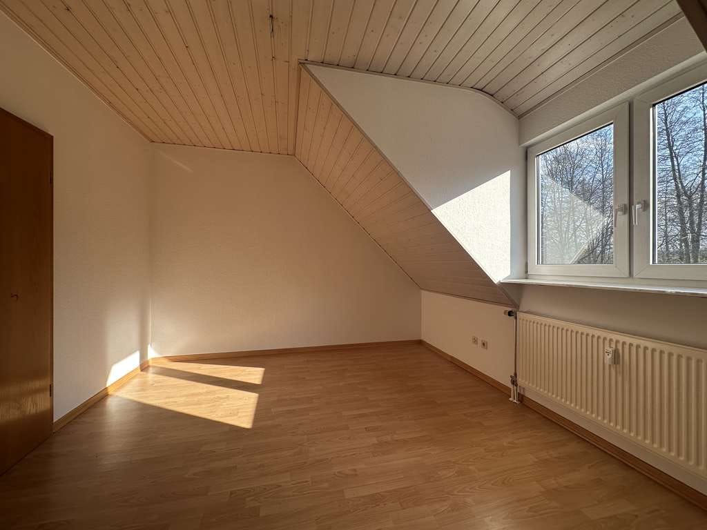 Immobilie in Mörlenbach - Helle Dachgeschosswohnung im Grünen - Bild 2
