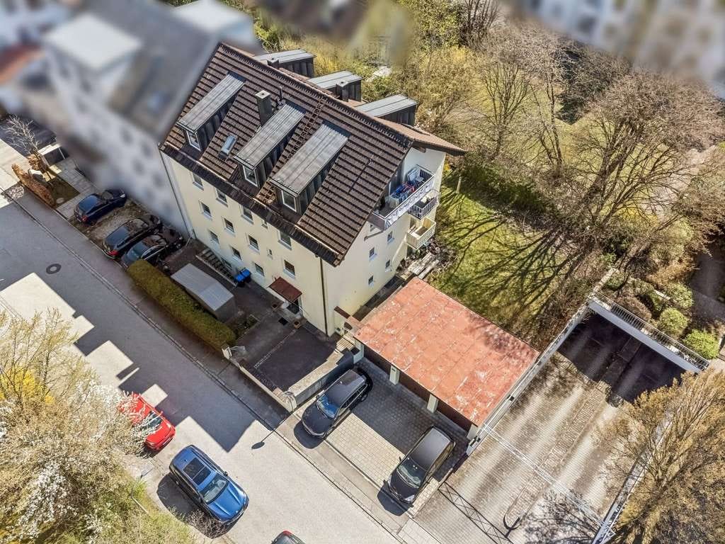 Immobilie in Krailling - Solides Mehrfamilienhaus mit 7 Wohnungen in ruhiger und zentraler Lage von Krailling - Bild 1
