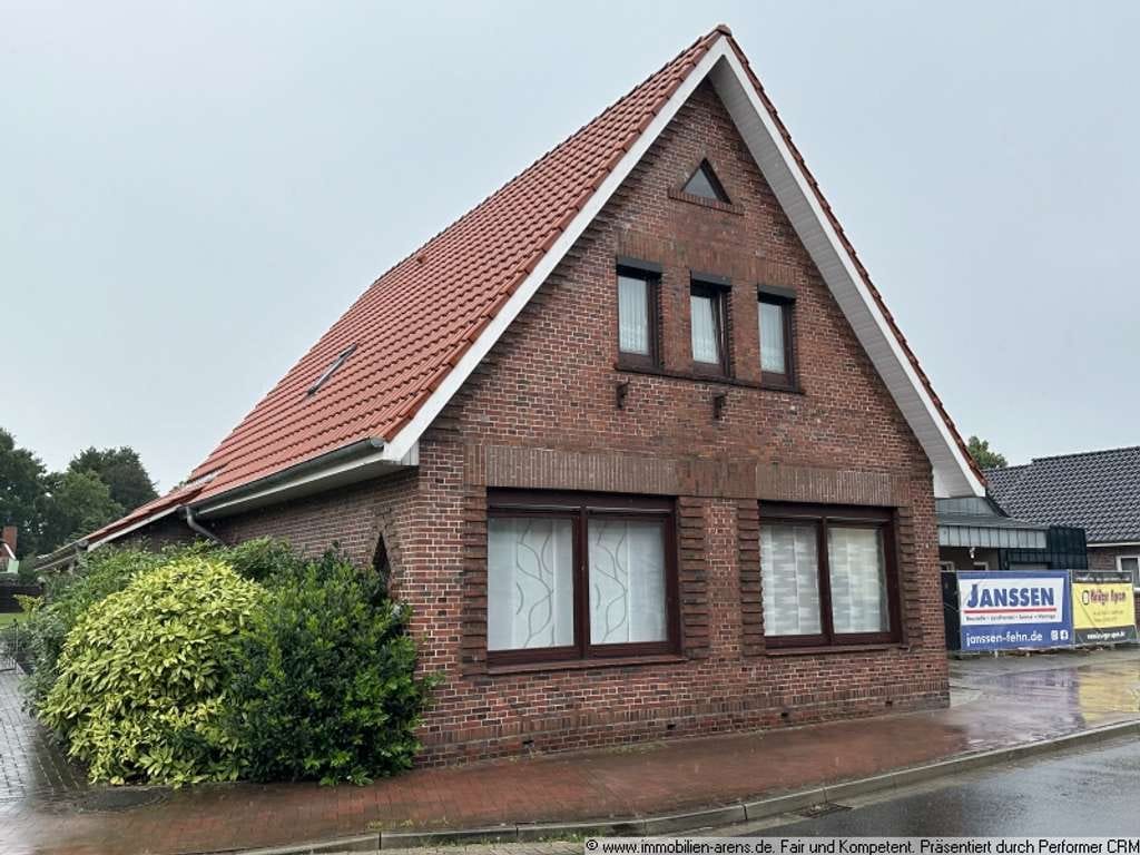Immobilie in Apen - solides Klinkergebäude mit Garage und Wintergarten in Apen - Bild 2
