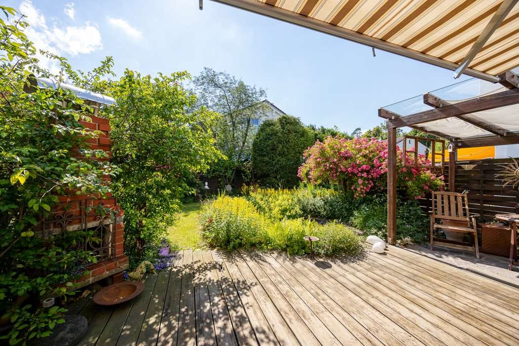 Immobilie in Neubiberg - Reiheneckhaus mit Garten in familienfreundlicher Siedlung - Bild 0