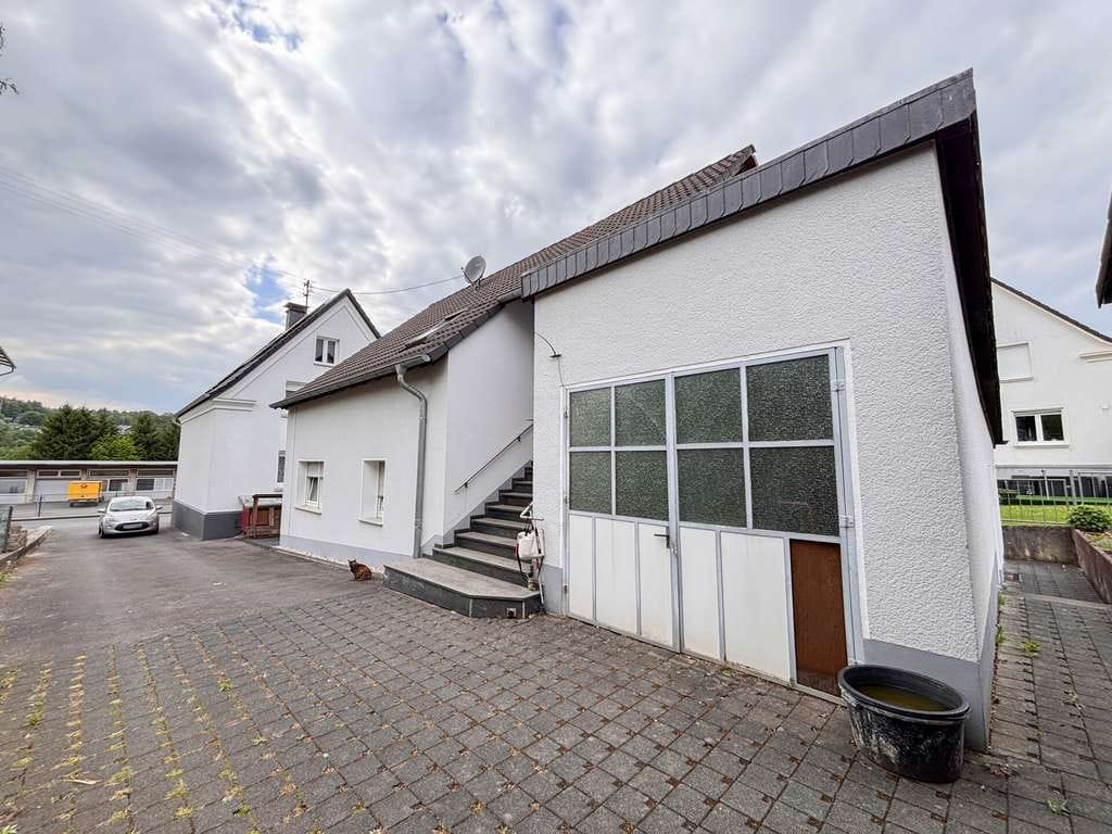 Immobilie in Windeck - Gepflegtes vermietetes Zweifamilienhaus in Windeck / Rosbach - Solide Kapitalanlage! - Bild 1