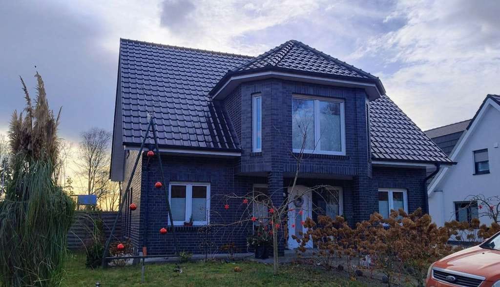 Immobilie in Twist - junge, hochwertige Immobilie mit Doppelgarage im Grünen - Bild 1