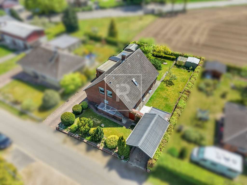Immobilie in Hennstedt - Feldrandlage! Einfamilienhaus ca. 170 m² Wohn- und Nutzfläche sowie Vollkeller in ruhiger Lage von H - Bild 4