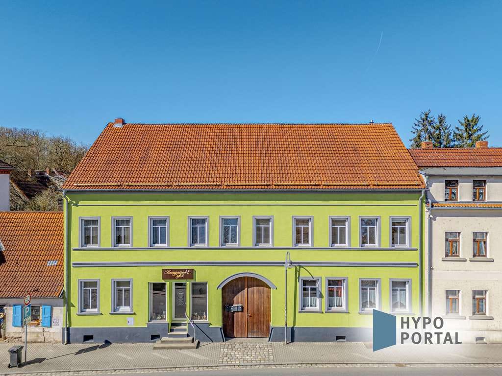 Immobilie in Teuchern - Vielseitiges Mehrfamilienhaus mit 4 Wohneinheiten und 1 Gewerbeeinheit in Teuchern - Bild 0