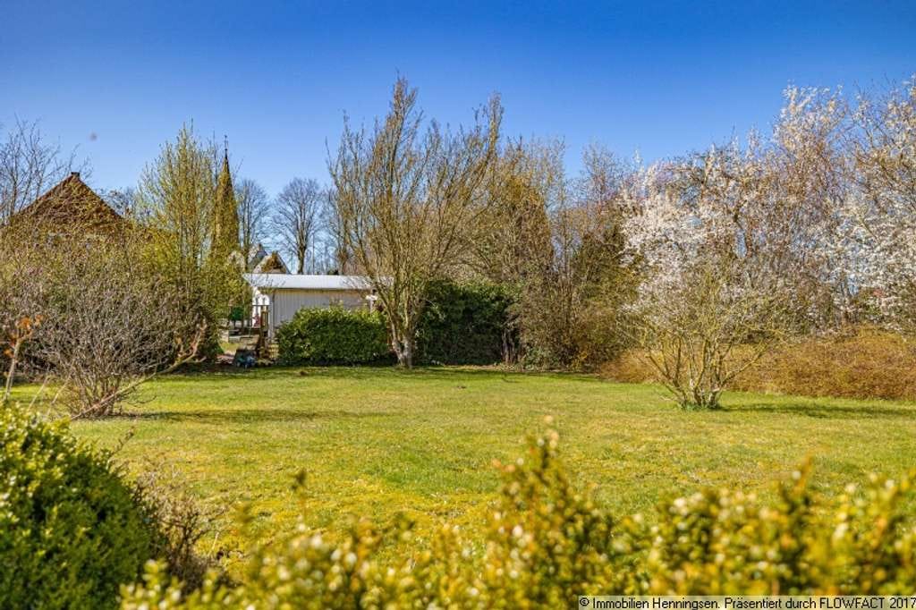 Immobilie in Süderbrarup - Völlig versteckt mitten im Ort - moderner Winkelbungalow mit großem Garten - Bild 3